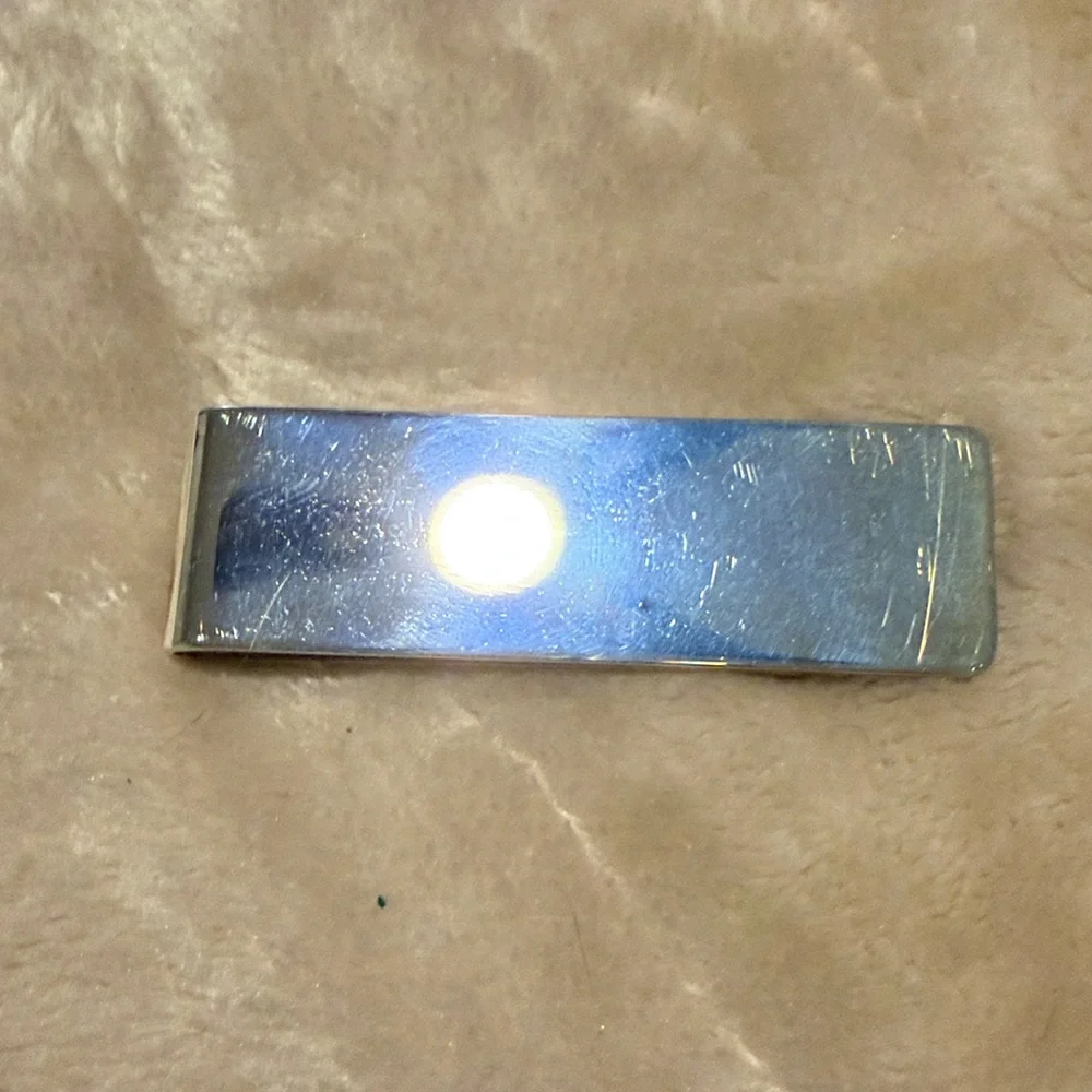Tiffany & Co. Sterling Silver Clip with pouch and box. No engraving